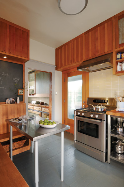 
At just 148 square feet, this formerly dysfunctional kitchen was made stylish and liveable with a few small changes—and a small budget.
